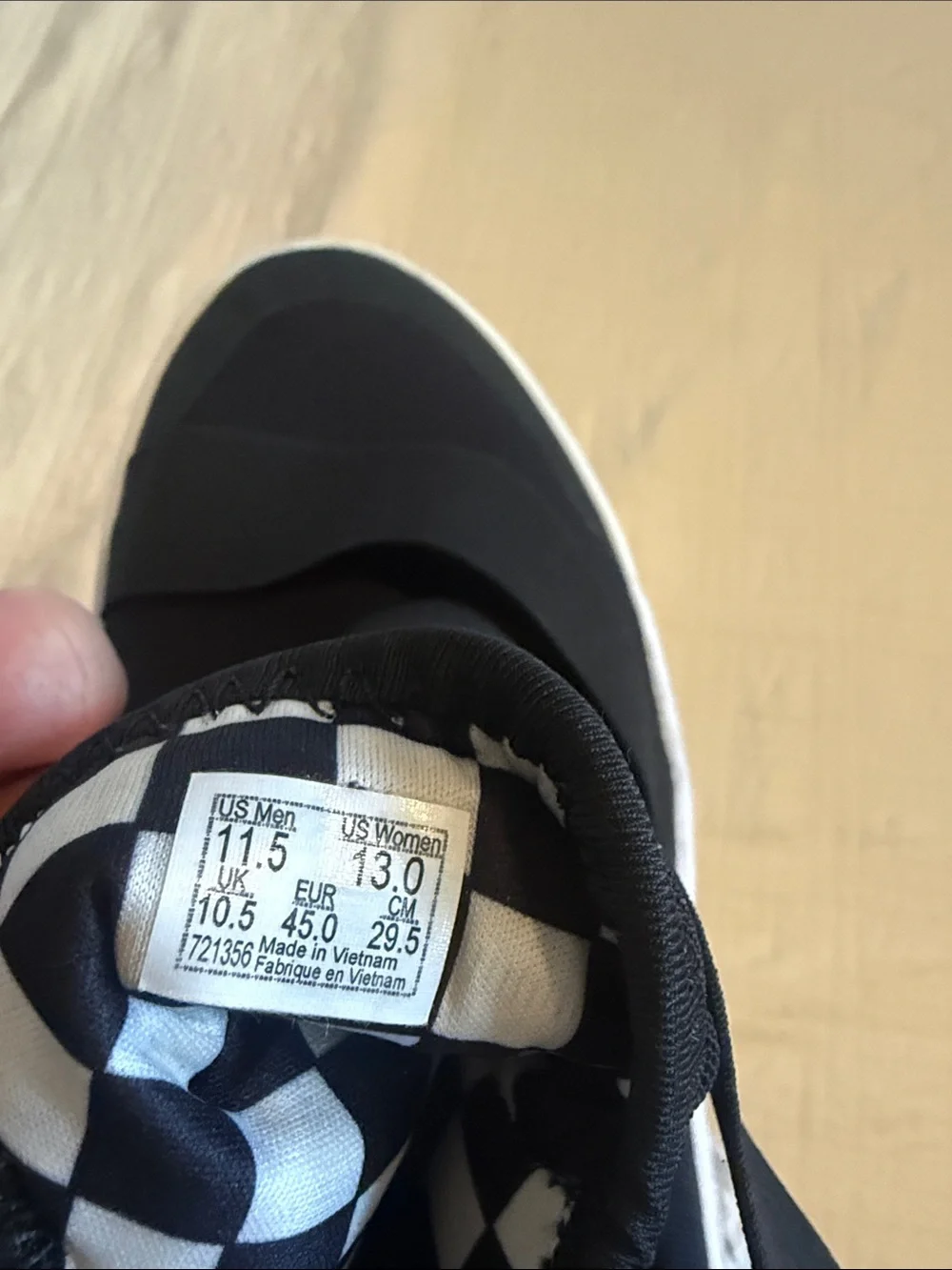 Vans Black and White UltraRange Slip-On Athletic Sneakers